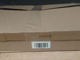 a box with a barcode on it sitting on a table