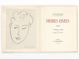 un livre ouvert sur lequel est dessiné le visage d'une femme