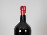 a bottle of wine that is sitting on a table