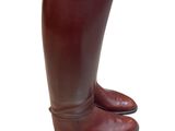 brown leather boots with wooden soles on a white background