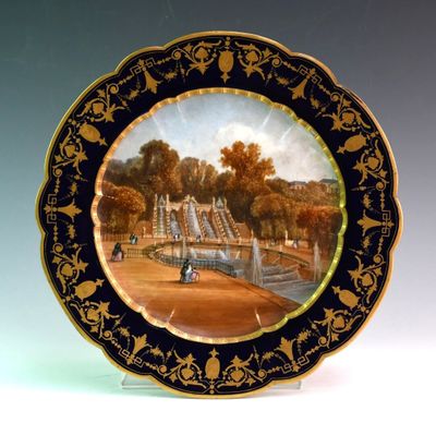 a plate with a picture of a castle on it