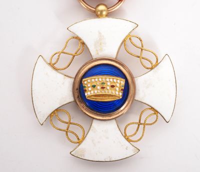 an image of a cross with a crown on top of it