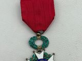 an image of a red ribbon with a star on it