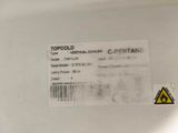 a label on the back of a white refrigerator