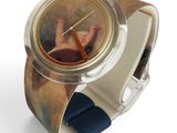 a wrist watch with a picture of a hand on it