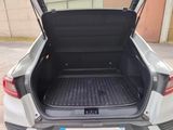 the back of a car with the trunk open and the back of the car with the trunk open