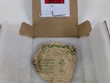 a cardboard box with a piece of paper inside of it