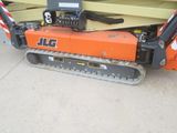 an image of a construction vehicle with a crane attached to it