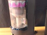 a blender that is sitting on a table next to a blender