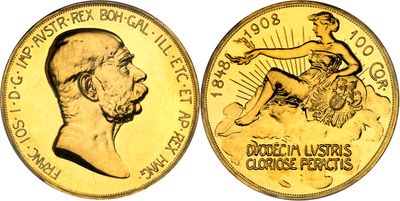 a close up of a gold coin with a man on it