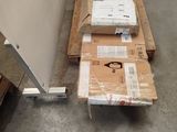 many boxes on a pallet in a warehouse