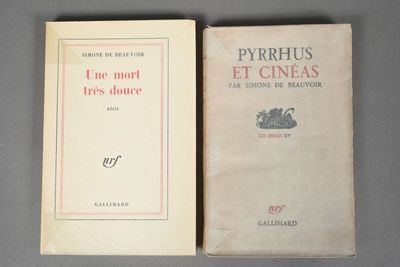 two books sitting on top of each other on a table