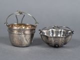 pair of silver plated bowls and a silver plated bowl