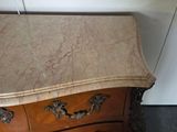 marble top chest of drawers in the style of louis xv