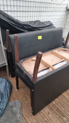 a bed that is sitting on a wooden floor