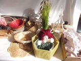 a table with baskets of yarn and other items on it
