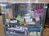a metal cart that has many items inside of it