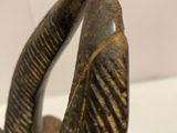 a close up of a statue of an animal on a table