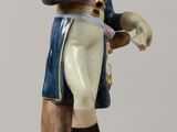 a figurine of a man in a military uniform