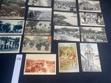 a lot of old postcards on display on a table