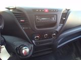 a dashboard of a car with a steering control