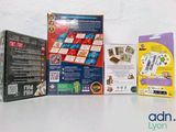 a lot of different games in the box on the table