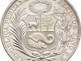 a close up of a coin on a white background