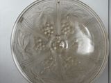 a glass plate with a flower design on it