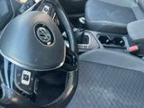 a close up of a steering wheel in a car