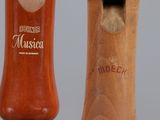 two wooden baseball bats that are next to each other