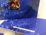 the box is blue and has a picture of a dog on it