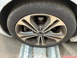 a close up of a car ' s tire on a ramp