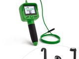a close up of a green and black digital thermometer on a white background