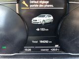 the dashboard of a car with a digital display showing the speed of the car