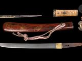 three different types of knives on display on a black background