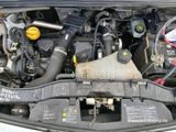a picture of a car engine with its hood open
