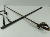 two swords on a white table with a pair of scissors
