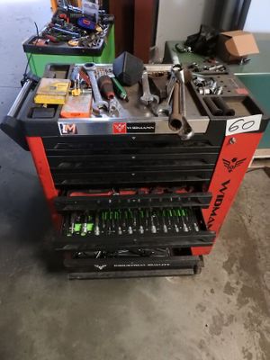 a workbench with a lot of tools in it