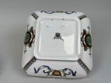 a square plate with a design on it and a square plate with a design on it