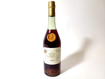 a bottle of wine that is sitting on a table