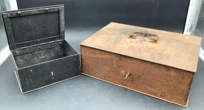 two old suitcases sitting next to each other on a table