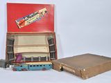 a box with a train set in it and a box with a train set in it