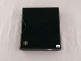 an image of a black box with a gold logo on it