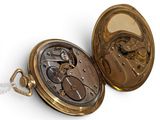 a close up of a pocket watch with a chain