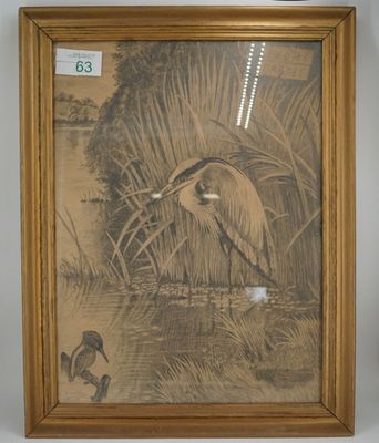 a picture of a bird that is standing in the water