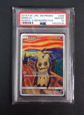 a close up of a pokemon card on a black surface