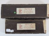 two boxes that have labels on them on them