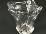 clear glass vase on a black background with a black background