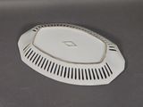 a white plate with a black and white design on it
