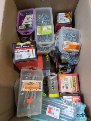 a box full of assorted screws and screws